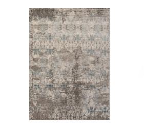 A modern take on a traditional carpet, with a thick wool pile in earthy colors and a faded design